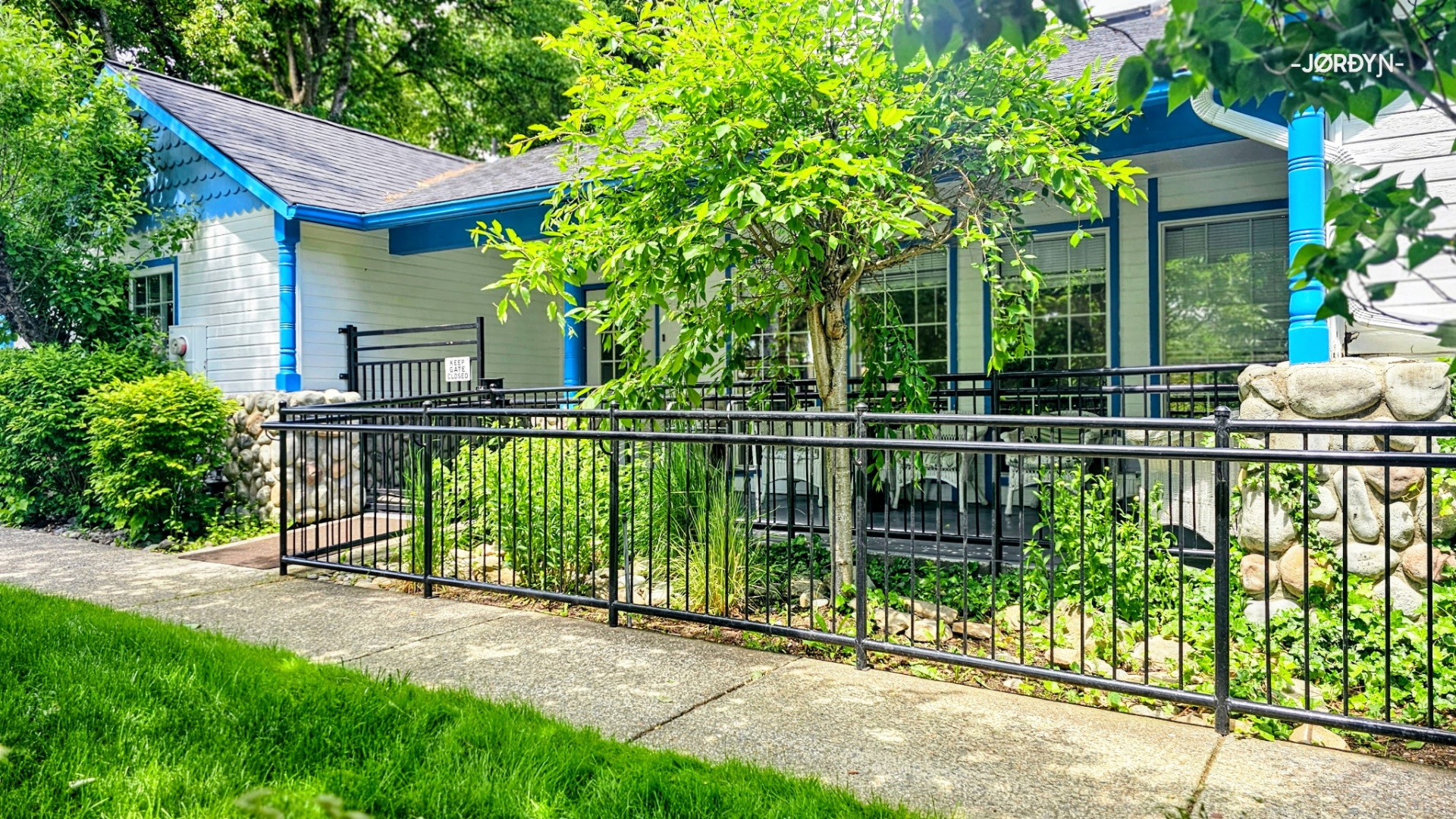 Blue-trimmed cottage porch