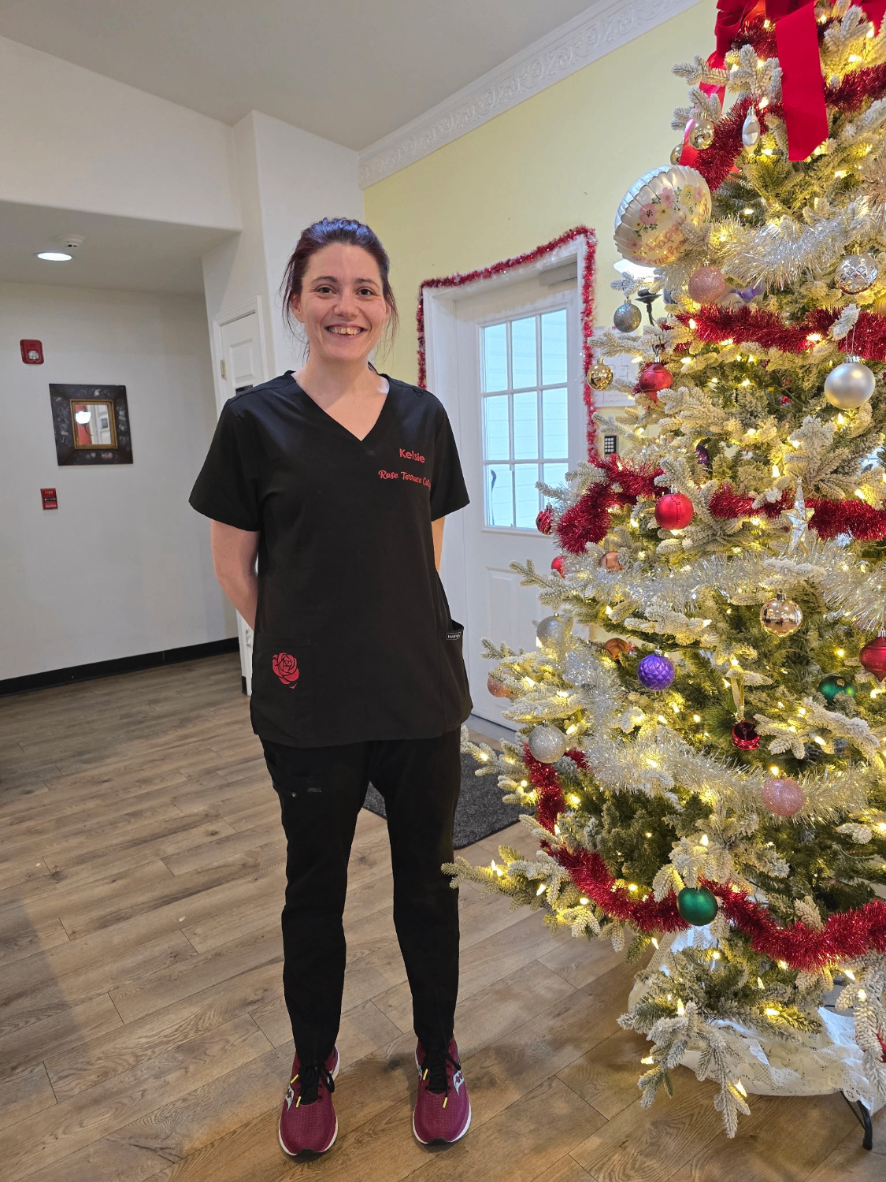 Kelsie by the Christmas tree