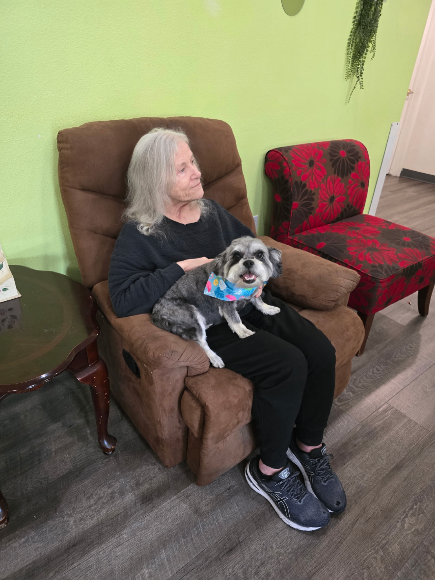 Resident relaxing with a furry friend