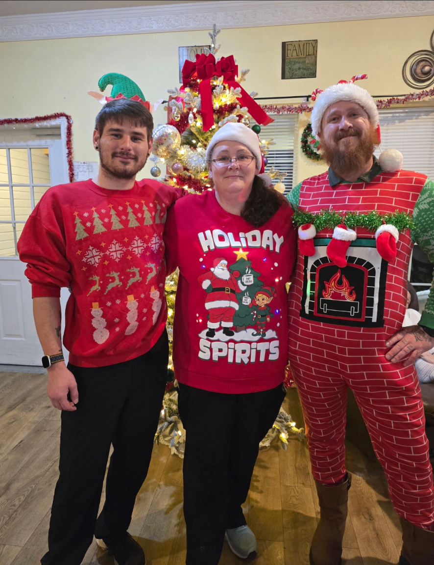 Ugly Christmas sweater night with staff