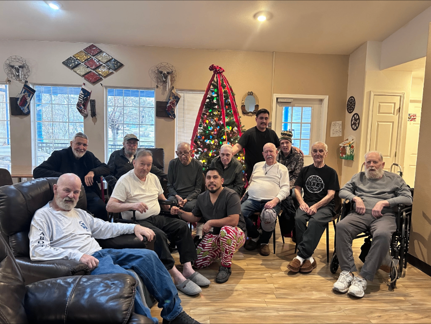 Residents gathered around the Christmas tree